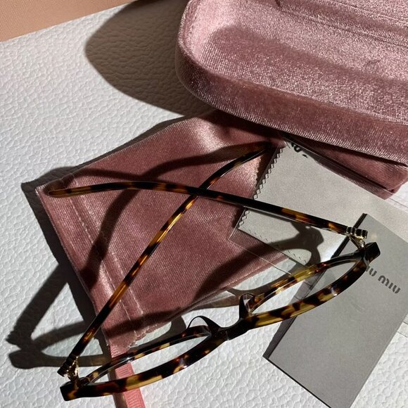 Miu Miu Black Oval Sunglasses w/ Gold Logo • Statement Luxe Vibes main image 4